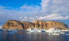 Midnight sun at Storoen Island. Uummannaq Fjord, northwest of Greenland beyond the arctic circle. Art Print